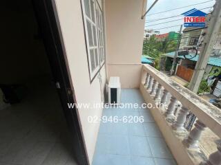 Balcony view with air conditioning unit
