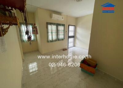 Main Living Space with tiled floor and air conditioning