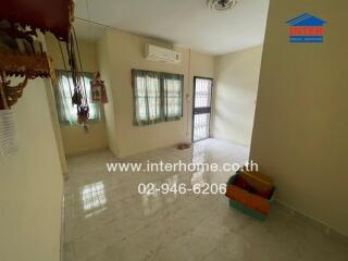 Main Living Space with tiled floor and air conditioning