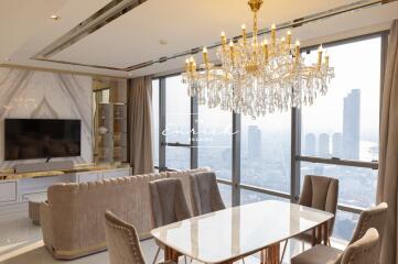 Modern living room with large windows and a city view