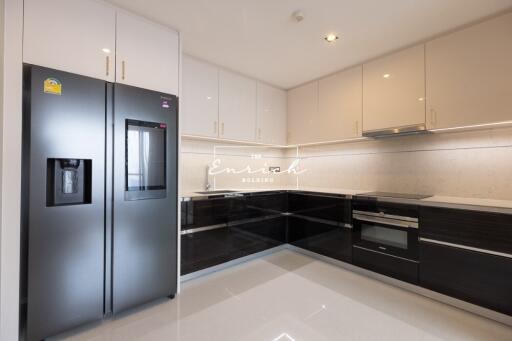 Modern kitchen with sleek black and white cabinetry