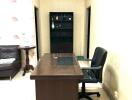 Office with desk and shelving unit