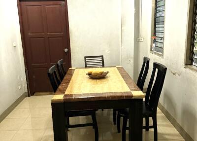 Dining area with table and chairs