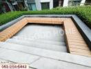 Outdoor seating area with wooden benches and steps