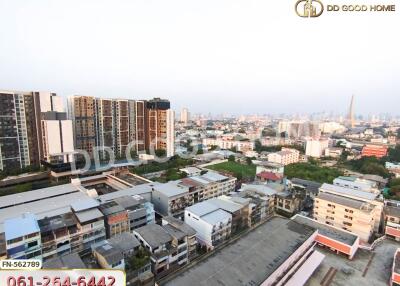 Aerial view of a city with buildings and apartments