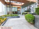 Modern building entrance with greenery