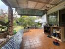 Covered patio area with garden view