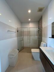 Modern bathroom with glass shower enclosure