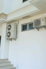 Exterior wall with air conditioning units