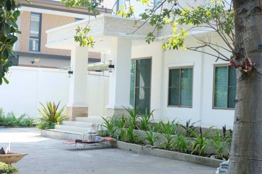 Outdoor view of a modern house with garden