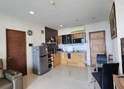 Modern kitchen and living area with appliances
