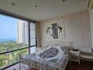 Bright bedroom with large windows and a view