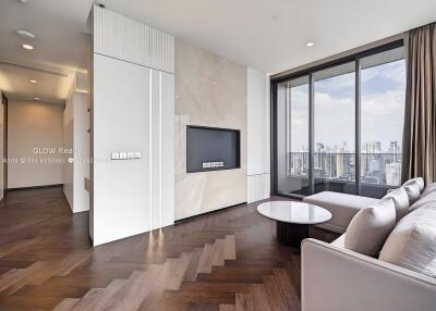 Modern living room with large windows and city view