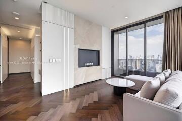 Modern living room with large windows and city view