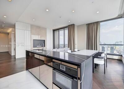 Modern kitchen with island and city view