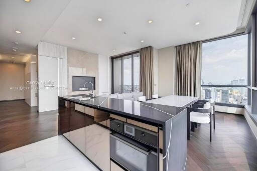 Modern kitchen with island and city view