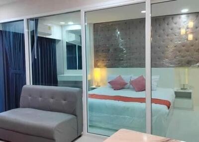 Modern bedroom with large glass partition