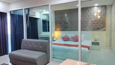 Modern bedroom with large glass partition