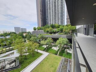 View of modern residential buildings with lush gardens