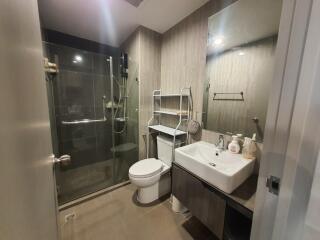 Modern bathroom with glass shower and sink