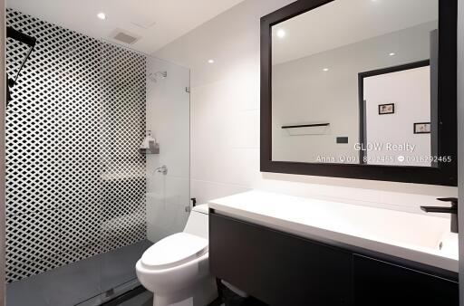 Modern bathroom with shower and vanity