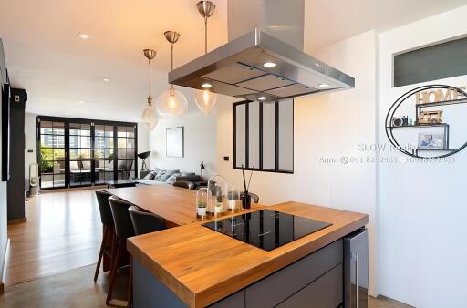 Modern kitchen with island and open living area