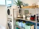 Laundry room with stacked washer dryer and shelving units