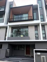 Front view of a modern multi-story residential building