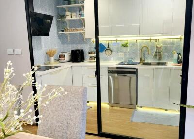 Modern kitchen with glass sliding door