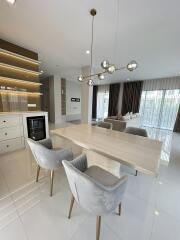 Modern living area with dining table and chairs