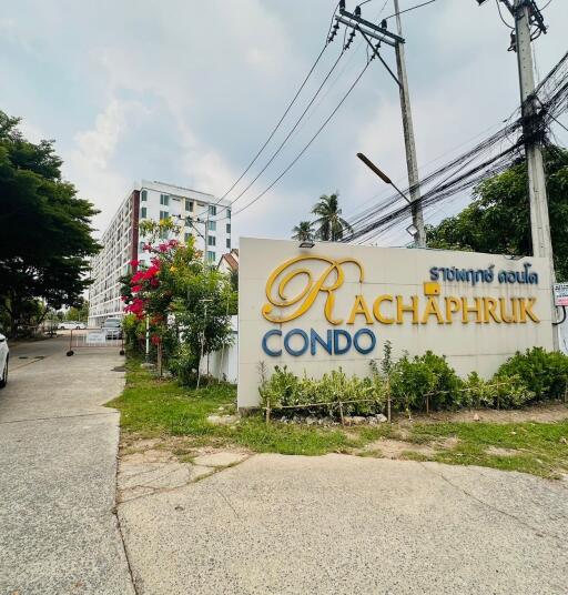 Condo building entrance with signboard