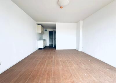 Empty room with wooden flooring