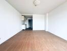 Empty room with wooden flooring