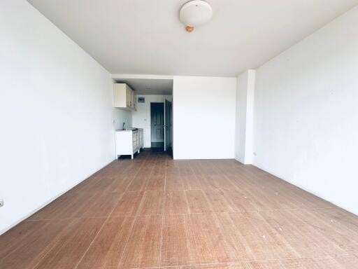 Empty room with wooden flooring