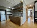 Modern kitchen with wooden cabinets and open shelving