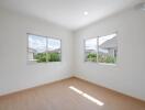 Bright and airy bedroom with large windows