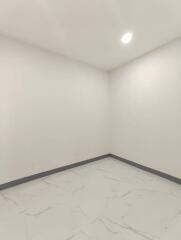 Unfurnished empty room with tiled floor and recessed lighting