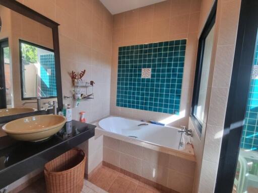 Bathroom with sink and bathtub