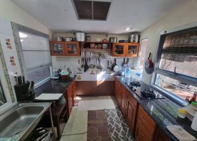 Modern kitchen with ample storage and natural light