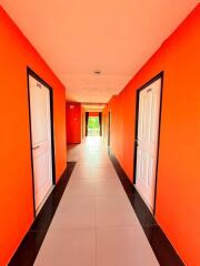 Brightly colored hallway with doors