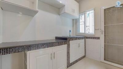 Modern kitchen with ample storage and sleek design