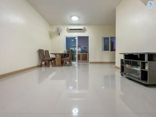 Spacious and well-lit dining area with minimalist furniture