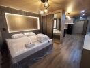 Modern bedroom with large bed and mirrored closet