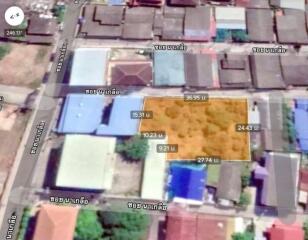 Overhead view of a plot of land in a neighborhood