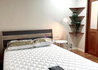 Modern bedroom with a double bed and minimalist decor