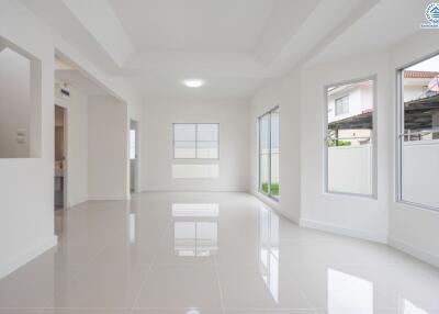 Spacious and bright main living area with large windows