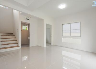 Spacious and bright living room with clean, modern design.