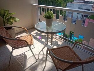 Cozy balcony with chairs and small table