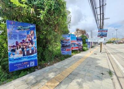 Outdoor sidewalk with advertisements