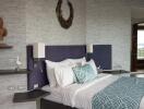 Modern bedroom with decorative accents and a comfortable bed